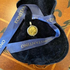 Authentic Konstantino sterling silver + Bronze coin charm with filigree detail.